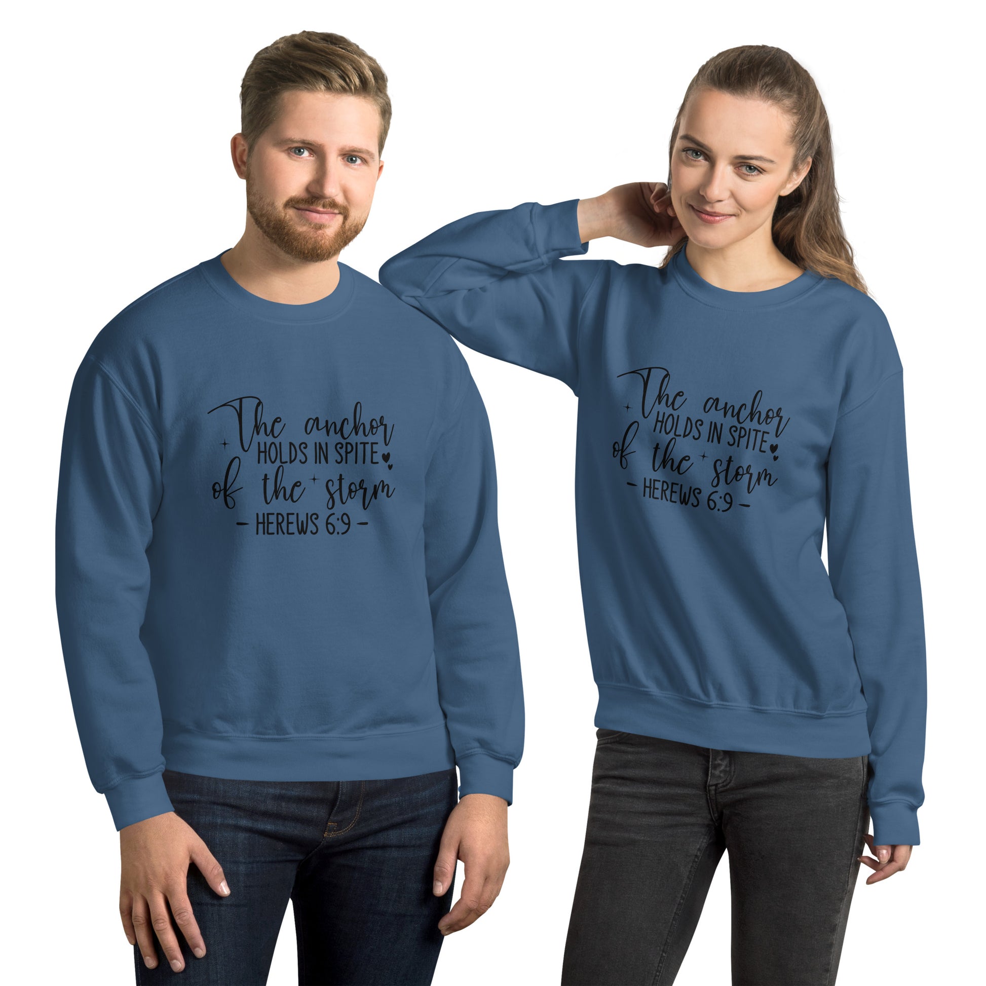 The Anchor Holds in Spit of the Storm (Hebrews 6:9) Sweatshirt Color: Indigo Blue