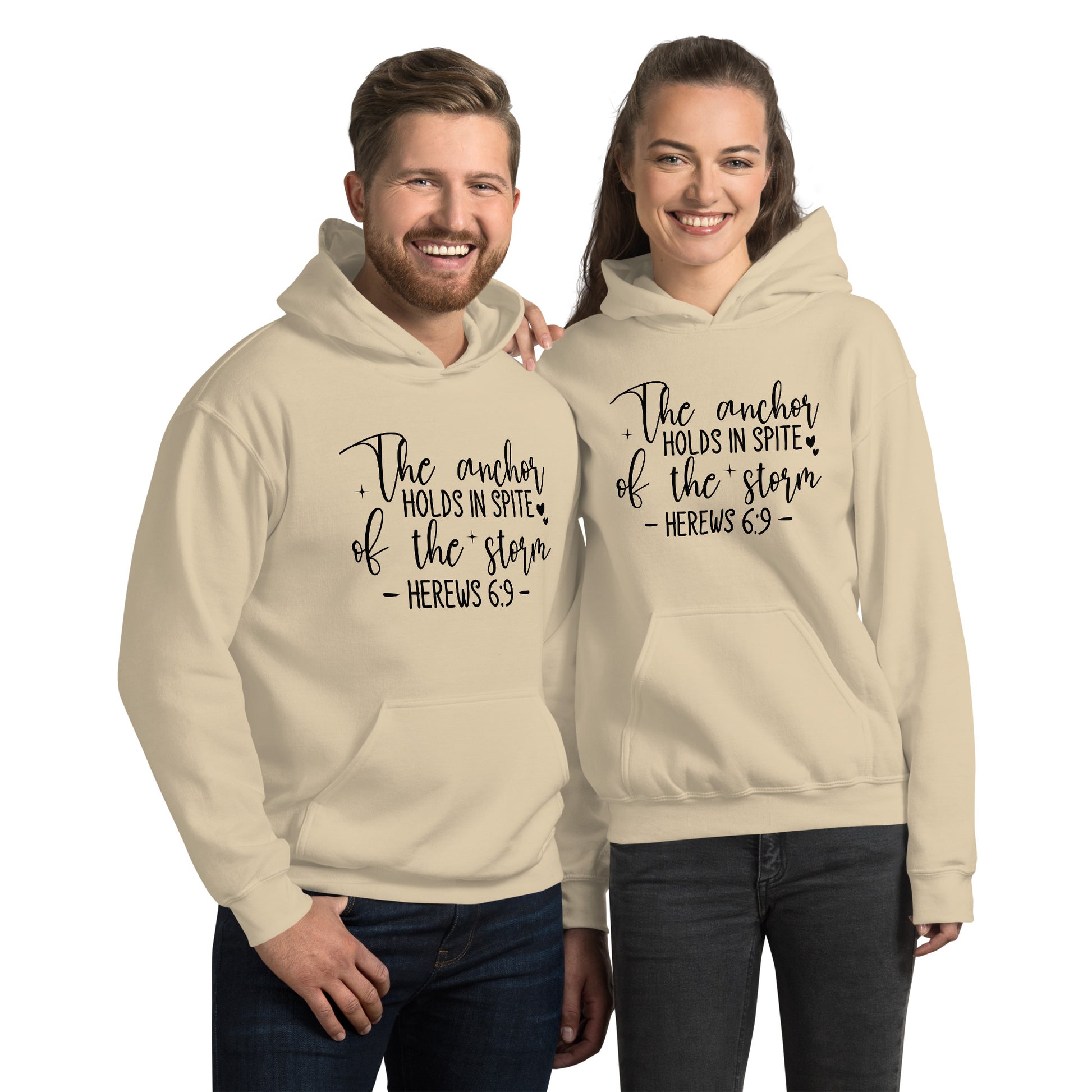 The Anchor Holds in Spit of the Storm (Hebrews 6:9) Hoodie Color: Sand